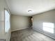 Spacious bedroom with neutral walls and carpet at 3245 Bunny Ln, Decatur, GA 30034