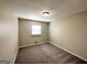 Simple bedroom with neutral walls and carpet at 3245 Bunny Ln, Decatur, GA 30034