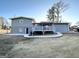 Gray house exterior with deck and landscaped yard at 3245 Bunny Ln, Decatur, GA 30034