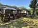 House backyard with deck and gazebo at 6074 Shallow Wood Ln, Douglasville, GA 30135