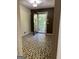 Small entryway with unique patterned tile flooring at 6074 Shallow Wood Ln, Douglasville, GA 30135