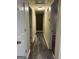 Clean hallway with light walls and wood-look flooring at 6074 Shallow Wood Ln, Douglasville, GA 30135