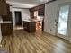 Kitchen with island, stainless steel appliances, and wood cabinets at 6074 Shallow Wood Ln, Douglasville, GA 30135
