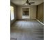 Open living room with view into another room at 6074 Shallow Wood Ln, Douglasville, GA 30135