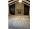 Spacious living room featuring a brick fireplace at 6074 Shallow Wood Ln, Douglasville, GA 30135