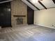 Living room with brick fireplace and high ceiling at 6074 Shallow Wood Ln, Douglasville, GA 30135
