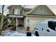 Two-story house with gray siding, a two-car garage, and a small front porch at 2408 Centenary Way Ct, Dacula, GA 30019