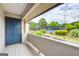 Outdoor balcony with views of the tennis courts and surrounding greenery at 3252 Clairmont North Ne, Brookhaven, GA 30329