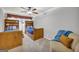 Twin bedroom with built in shelving and ceiling fan at 3252 Clairmont North Ne, Brookhaven, GA 30329