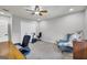 Bedroom with desk, chair, exercise bike and ceiling fan at 3252 Clairmont North Ne, Brookhaven, GA 30329