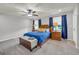 Bedroom with blue bedding and nightstands at 3252 Clairmont North Ne, Brookhaven, GA 30329
