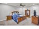 Bedroom with wooden furniture and TV at 3252 Clairmont North Ne, Brookhaven, GA 30329