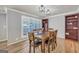 Dining room with hardwood floors, built in shelving and wood table at 3252 Clairmont North Ne, Brookhaven, GA 30329
