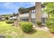 A brick multi-story building with well-maintained landscaping and greenery at 3252 Clairmont North Ne, Brookhaven, GA 30329