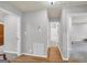Hallway with hardwood floors, access to bathroom and bedrooms at 3252 Clairmont North Ne, Brookhaven, GA 30329
