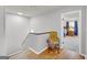 Upper level hallway with access to bedroom and stairs at 3252 Clairmont North Ne, Brookhaven, GA 30329
