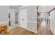 Hardwood floor hallway offering view into kitchen at 3252 Clairmont North Ne, Brookhaven, GA 30329