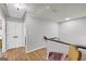 Upper hallway with hardwood floors and access to bedrooms at 3252 Clairmont North Ne, Brookhaven, GA 30329
