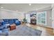 Bright living room features hardwood floors, fireplace, and ample natural light at 3252 Clairmont North Ne, Brookhaven, GA 30329