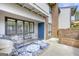 Cozy patio with seating area and a built-in grill at 3252 Clairmont North Ne, Brookhaven, GA 30329