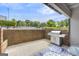Private patio with built-in grill and views of community amenities at 3252 Clairmont North Ne, Brookhaven, GA 30329