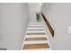 Clean staircase with wooden steps and white risers at 3252 Clairmont North Ne, Brookhaven, GA 30329