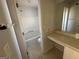 Clean bathroom featuring a bathtub and vanity at 4010 Peachtree Farms Rd, Rex, GA 30273