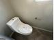 Updated half bathroom with new toilet and fixtures at 4010 Peachtree Farms Rd, Rex, GA 30273