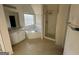 Bathroom with corner tub, shower, and window at 4010 Peachtree Farms Rd, Rex, GA 30273
