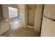 Bathroom with corner tub, shower, and window at 4010 Peachtree Farms Rd, Rex, GA 30273