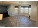 Breakfast nook with herringbone floors and bay window at 4010 Peachtree Farms Rd, Rex, GA 30273