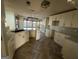 Updated kitchen, featuring white cabinets and herringbone floors at 4010 Peachtree Farms Rd, Rex, GA 30273