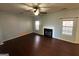 Living room with fireplace and hardwood floors at 4010 Peachtree Farms Rd, Rex, GA 30273