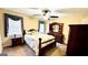 Well-lit bedroom with a double bed and ceiling fan at 65 Merideth Trce, Sharpsburg, GA 30277