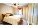 Cozy bedroom with a double bed and ceiling fan at 65 Merideth Trce, Sharpsburg, GA 30277