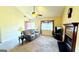 Living room featuring a fireplace and comfy seating at 65 Merideth Trce, Sharpsburg, GA 30277