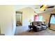 Living room with vaulted ceiling, fireplace, and recessed lighting at 65 Merideth Trce, Sharpsburg, GA 30277