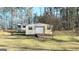 Detached workshop with large roll-up door and RV parking at 65 Merideth Trce, Sharpsburg, GA 30277