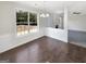 Dining room features wainscoting and hardwood floors at 1535 Valley Club Dr, Lawrenceville, GA 30044