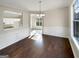 An elegant dining room featuring hardwood floors and lots of natural light at 1535 Valley Club Dr, Lawrenceville, GA 30044