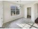 Bright dining area with decorative chandelier and natural light at 1535 Valley Club Dr, Lawrenceville, GA 30044