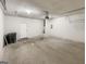 The two-car garage features an automatic door opener and additional storage space at 1535 Valley Club Dr, Lawrenceville, GA 30044