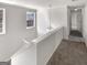 Hallway with natural light and access to bedrooms at 1535 Valley Club Dr, Lawrenceville, GA 30044