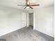 Comfortable bedroom featuring gray carpet and a ceiling fan at 1535 Valley Club Dr, Lawrenceville, GA 30044