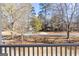 View from porch overlooking a tree-lined street at 200 Tiverton Trl, Peachtree City, GA 30269