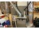 Image shows the furnace and hot water heater in the basement at 155 Carriage Gate Dr, Sharpsburg, GA 30277
