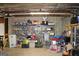 Unfinished basement area with shelving for storage at 155 Carriage Gate Dr, Sharpsburg, GA 30277