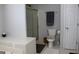 Bathroom with shower, toilet and a vanity at 155 Carriage Gate Dr, Sharpsburg, GA 30277
