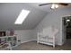 Charming Bedroom featuring a crib and plenty of storage at 155 Carriage Gate Dr, Sharpsburg, GA 30277