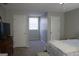 Spacious bedroom with walk-in closets and neutral walls at 155 Carriage Gate Dr, Sharpsburg, GA 30277